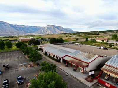 Western Colorado commercial center with grocery store tenant - image 1