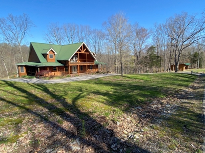 ESTATE AUCTION Beautiful Custom Built Log Home and 57+/- Ac - image 8