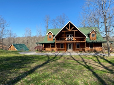 ESTATE AUCTION Beautiful Custom Built Log Home and 57+/- Ac - image 2