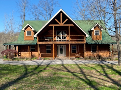 ESTATE AUCTION Beautiful Custom Built Log Home and 57+/- Ac - image 1