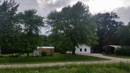 ABSOLUTE Real Estate Auction: Home on 5 acres in Barton Co. - image 4