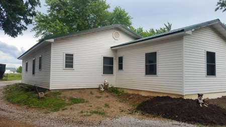 ABSOLUTE Real Estate Auction: Home on 5 acres in Barton Co. - image 2