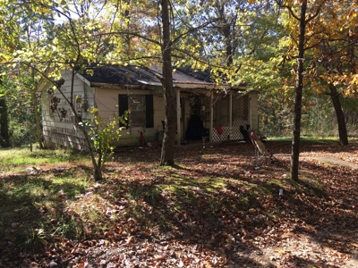 Fixer Upper Home and Building Lots Selling at Auction - image 1